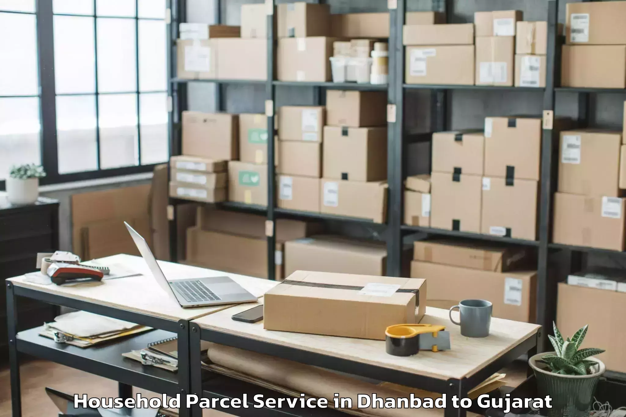 Affordable Dhanbad to Porbandar Airport Pbd Household Parcel